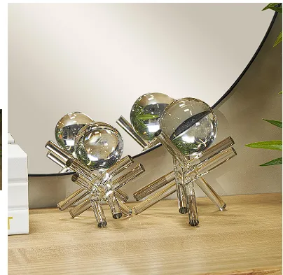 CLEAR CRYSTAL ABSTRACT JACK INSPIRED SCULPTURE WITH CLEAR RESTING ORBS,